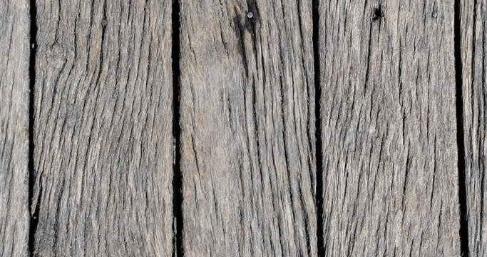 Video background wooden texture. Old grey wood texture close up. Barn wall texture or rustic fence Light grey flat wood banner billboard or signboard.