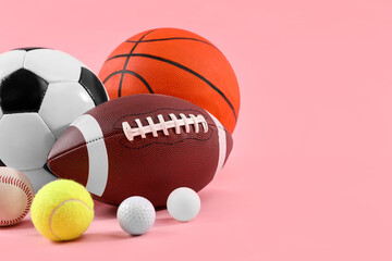 Many different sports balls on pink background, space for text