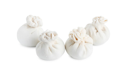 Uncooked khinkali (dumplings) isolated on white. Georgian cuisine