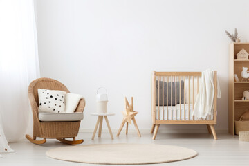 A bright Scandinavian nursery design with natural wooden furniture, a wicker chair, and minimalist decor on a white, airy background