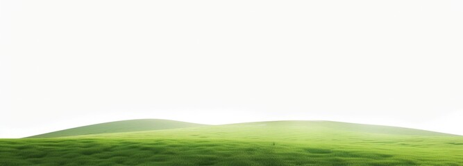 A green field stretches out with a hill rising in the backdrop, adding depth to the landscape under a clear sky.