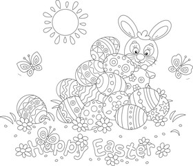 Greeting card with a happy Easter bunny and a pile of painted gift eggs on a pretty sunny lawn with spring flowers and merry butterflies fluttering around, vector cartoon illustration