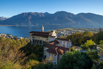 Fototapeta na wymiar The village of Locarno on the Lago Maggiore, Kanton Ticino, Church Madonna del Sasso, Orselina, Switzerland. Site of Roman Catholic pilgrimage founded after a vision of the Virgin Mary appeared 1480