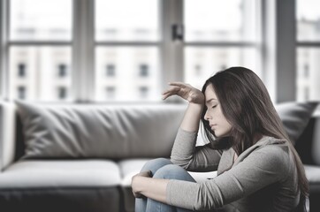 Sad Depressed young Woman at Home