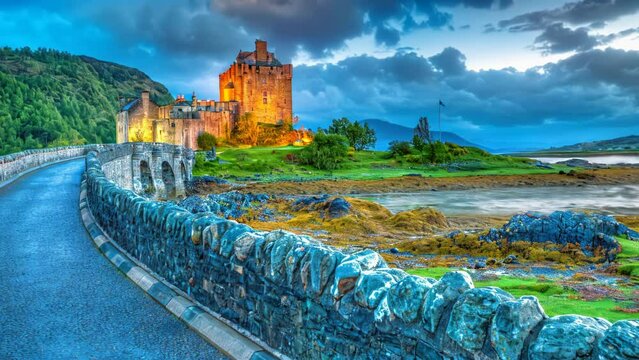Eilean Donan Castle at night, Dornie, Kyle of Lochalsh in Scotland, United Kingdom. It is the most visited castle, situated on an island at the confluence of three sea lochs.