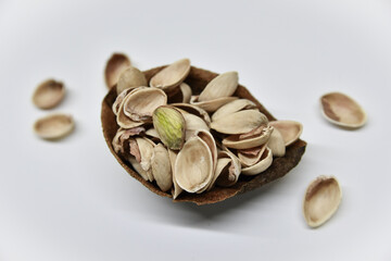 Photos of peeled pistachio in shell