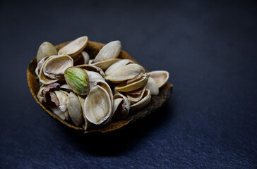 Photos of peeled pistachio in shell