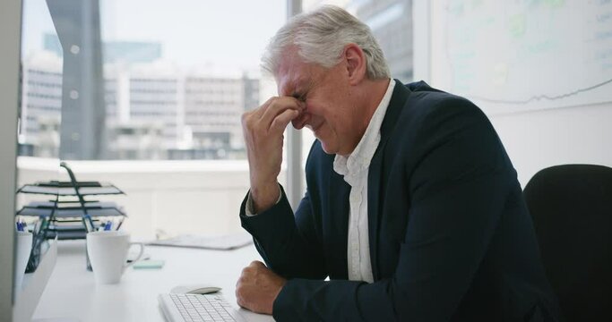 Business man, stress and headache on computer for stock market mistake, bad investment or bankruptcy news. Senior executive with depression, pain or sad for trading risk or financial debt in office