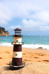 Lighthouse at the beach - 750888354