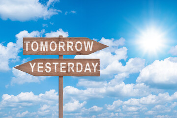 Tomorrow or yesterday road sign on sky background business concept.