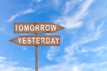 Tomorrow or yesterday road sign on sky background business concept.