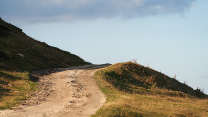 A fragment of the soil of a mountain road. Copy space.