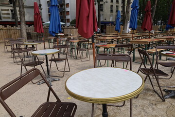 restaurant table and terrace on the Ourcq canal in Paris 19th arrondissement