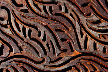 Rust and patina on sidewalk Grating 