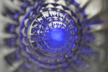 infinite glass vortex  with blue light reflections