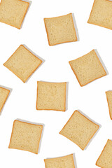 A stack of white toasted bread on a white isolated background