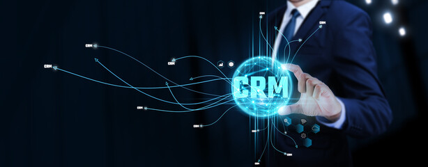 CRM: Businessman Touching Digital Global Network of Customer Relationship Management Data Exchange....