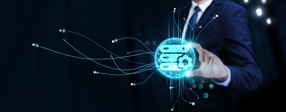 Database Management: Businessman Touching Digital Global Network of Database Data Exchange. Seamless Integration on Social Network Connection with Hologram Modern Interface, Efficient Data Handling.