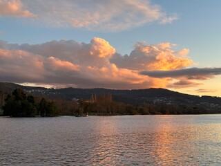 Colored sunset clouds over the river Minho, Vila Nova de Cerveira, Viana do Castelo, Portugal, December 2022