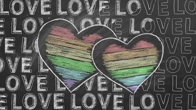 Two hearts in rainbow colors outlined in chalk and word LOVE is repeated throughout the image on a blackboard. LGBT, LGBTQIA rights and gender equality concept. Pride month. Declaration of love.