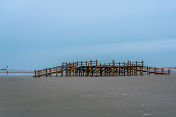 Pile dwelling on the Norsee beach of Sankt Peter-Ording in Germany