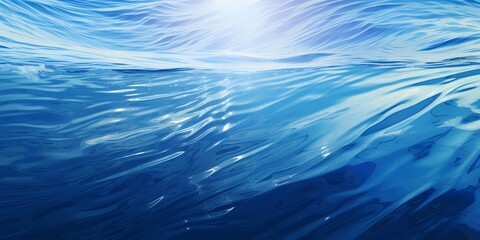 Deep ocean blue 3D waves with a reflective sheen, their surface mirroring the surrounding environment with clarity.