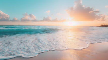 Serene Beach Sunset with Gentle Waves and Cloudy Sky