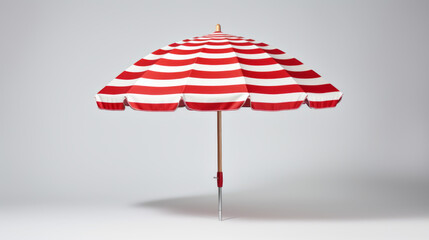 A red and white striped beach umbrella and isolated on a white background
