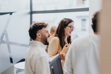 Business people collaborating and sharing ideas in office.