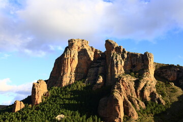 Naklejka premium Peña Bajenza is a large rock formation situated just above the village of Islallana in the Spanish province of La Rioja