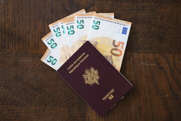 french passport and euros banknotes