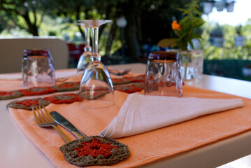 romantically set table for two on the garden patio