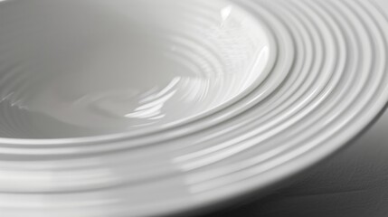 Fototapeta na wymiar A close-up shot of a white bowl on a table, suitable for various food or kitchen-related concepts