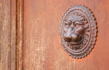 Metal door decor in shape of lion's head, Germany