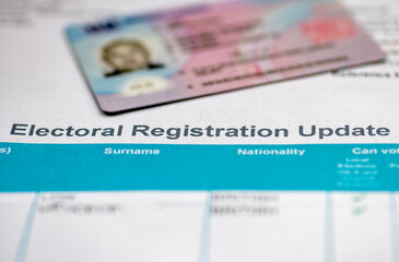 An Electoral Registration Update document with a driving licence, with changes where voters need to...