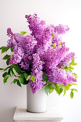 A bouquet of beautiful lilacs in a vase.