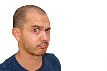expressive bald man making funny face , suspicious