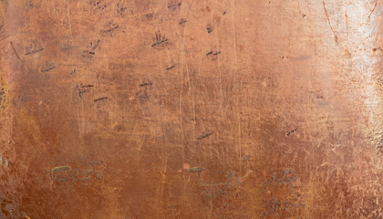 texture of old metal copper sheet with scratches; background and wallpaper
