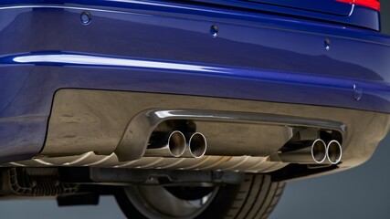Quad exhaust pipes on a car