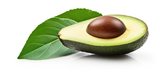 A half of a ripe avocado is displayed with a vibrant green leaf on a clean white background. The avocado is fresh, and the leaf adds a touch of natural color to the scene.