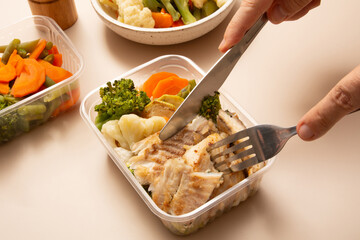Healthy packed lunch box home prepared meal in front top view clean beige background aerial view