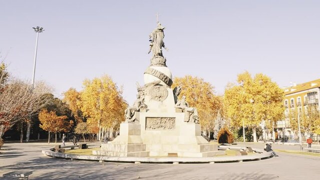 VALLADOLID, SPAIN - DECEMBER 6 2017: Monument to Colon de Valladolid in Spain. Figure of navigator Cristobal Colon looks straight ahead of that of writer Jose Zorrilla, in Plaza de Zorrilla.