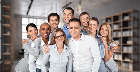 Group team of happy successful employees in workspace