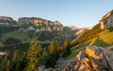 Beautiful early morning summer view with warm light on Marwees mountain and summit, seen from Aescher Mountain cabin in the Swiss Appenzell Alpen. Morning in the beautiful Swiss Alps. Mountain view.