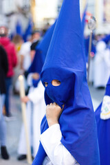 Lovely image of a little penitent during Holy Week in Andalusia.