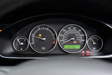 Car speedometer and dashboard with ICE symbol 