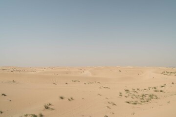 Fototapeta na wymiar Desert landscape against blue sky
