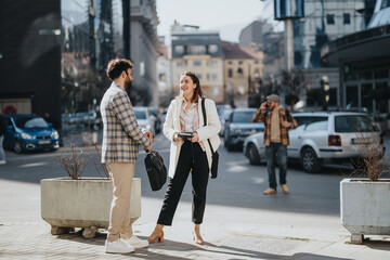 Two young professionals having an informal business discussion outside, with a focus on strategy and market trends.