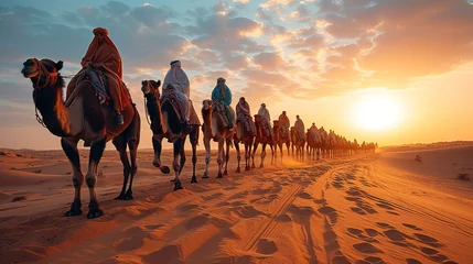 Zelfklevend Fotobehang smiling children riding their camels traveling in the UAE desert in a sunny morning © Salsabila Ariadina