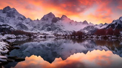 Rolgordijnen Panoramic view of snowy mountains reflected in a lake at sunset © Iman